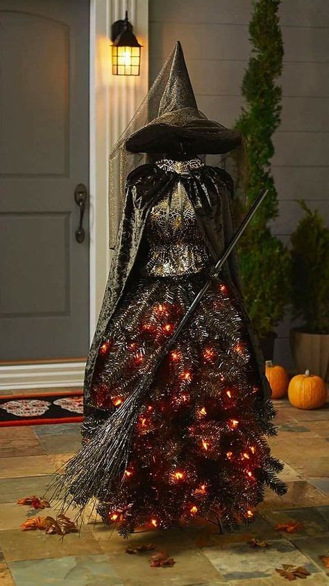 Halloween witch on tree figurine